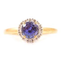 A tanzanite and diamond cluster ring.