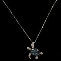 Effy - a Turtle design white metal, diamond and blue diamond pendant and chain.