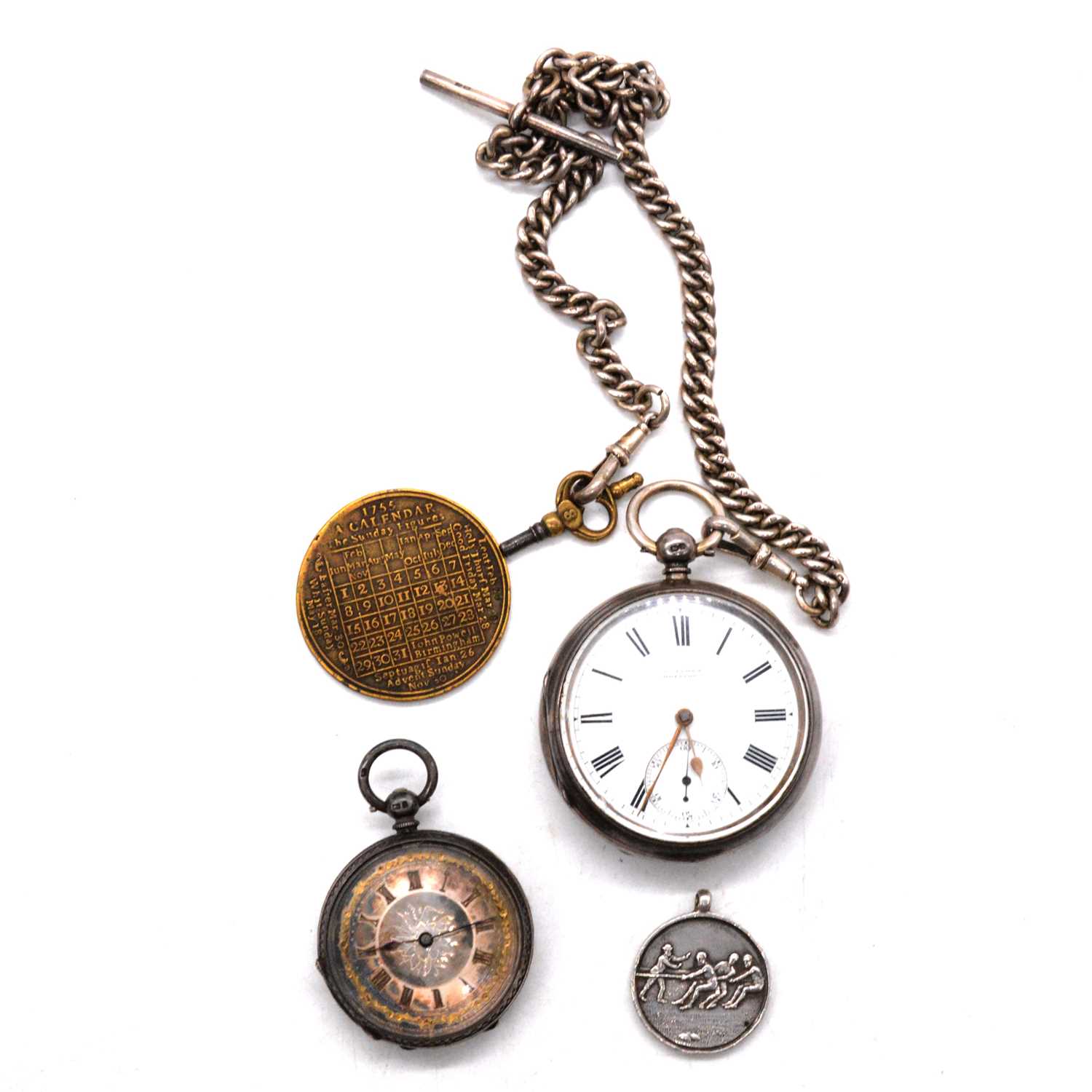 Two silver open face pocket watches, a silver double Albert watch chain, medal and brass calendar.