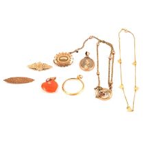 Two gold brooches, gold-plated brooch, yellow metal necklace and other yellow metal items.