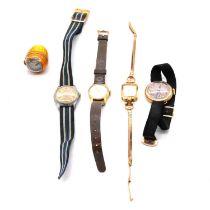 Three ladies' yellow metal wristwatches, a vintage wristwatch, and a watch pendant.