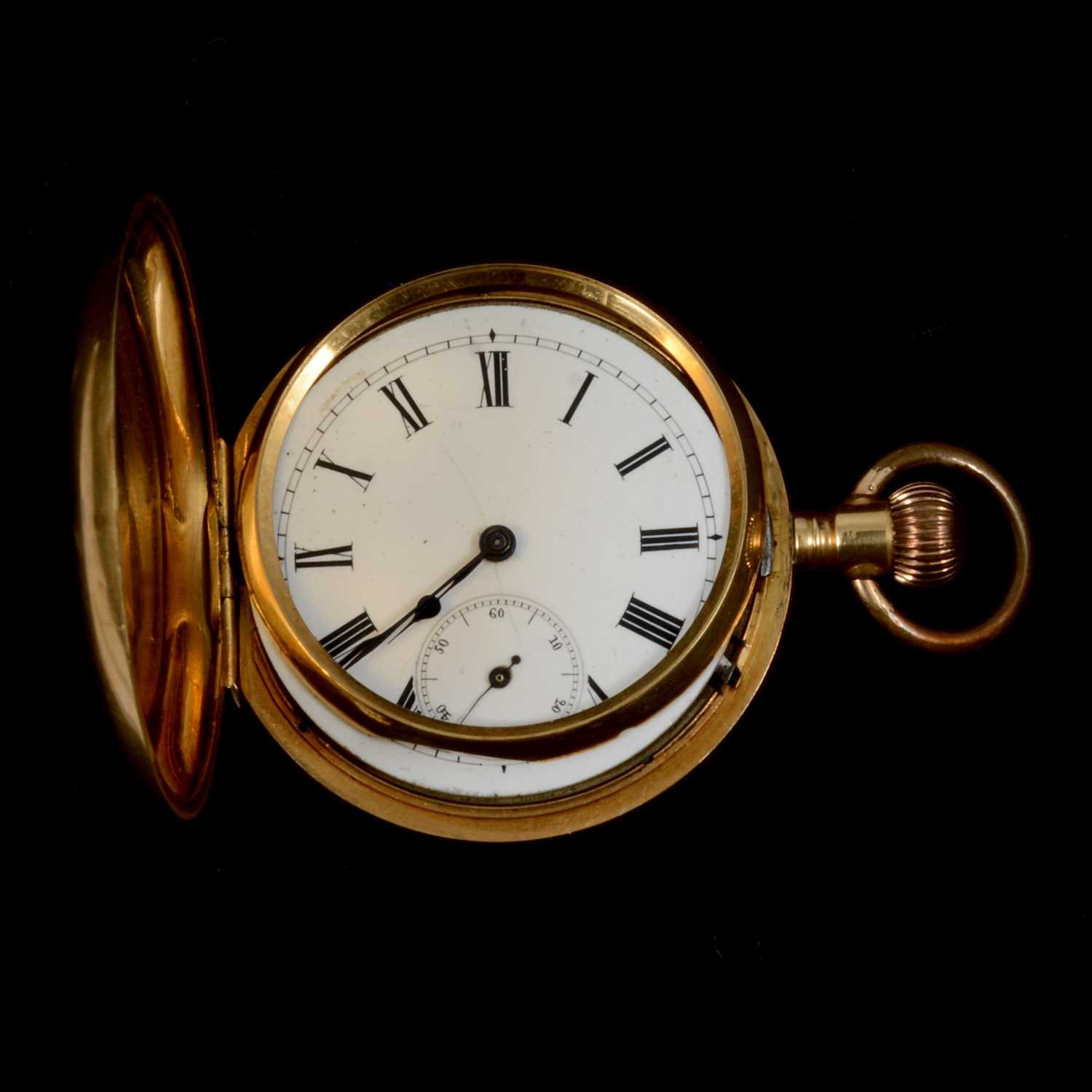 A yellow metal full hunter pocket watch.