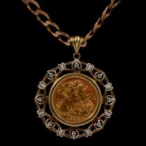 A Gold Half Sovereign Coin pendant, Elizabeth II 1982, and chain.