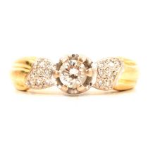 A diamond solitaire ring.