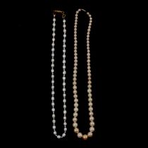 A freshwater pearl necklace, a cultured pearl necklace, bracelet, earrings and pendant.