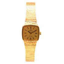 Omega - a lady's 9 carat yellow gold bracelet wristwatch