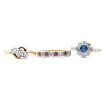 Three gemset rings, diamond, sapphire, ruby.