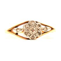 A vintage diamond cluster ring.