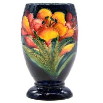 Walter Moorcroft for Moorcroft, a vase in the Freesia design.