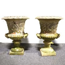 Pair of reconstituted stone campana-shape garden urns.