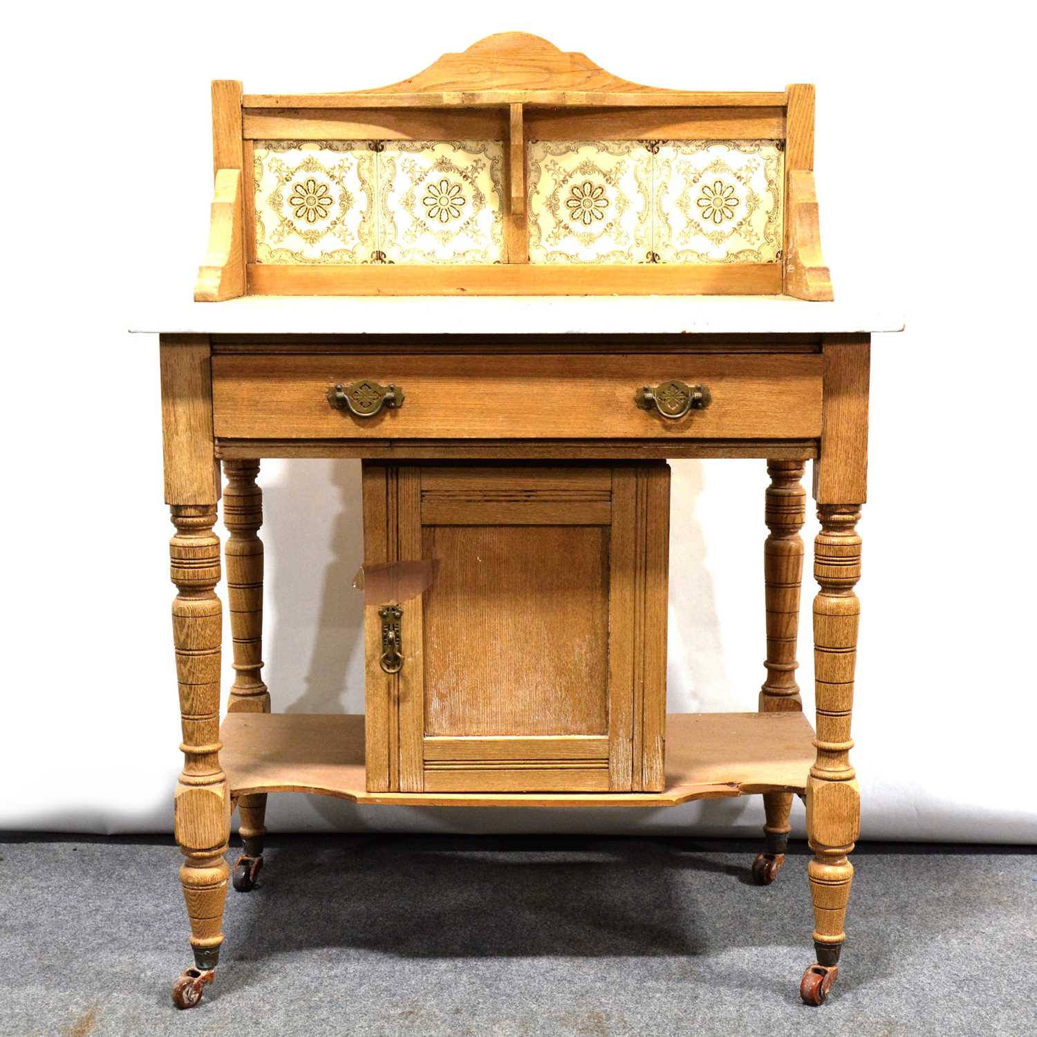 Victorian oak marble-top washstand with tile back