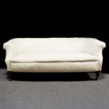 Small Edwardian Chesterfield settee.