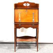 An Arts and Crafts mahogany bureau; and an Art Nouveau copper dustpan