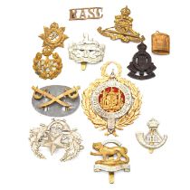 Military cap badges, patches, pins, buttons, and some coins.