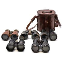 Pair of WWI binoculars, cased and other binoculars,