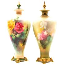 Near pair of Royal Worcester vases and covers