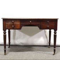 Victorian mahogany five-drawer writing table.