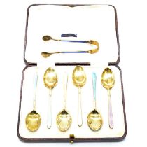 Set of six silver and enamelled teaspoons, William Suckling Ltd, Birmingham 1929, and sugar tongs.