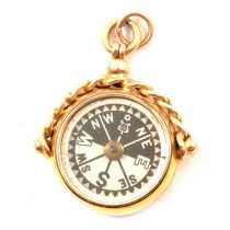 9ct gold cased compass,