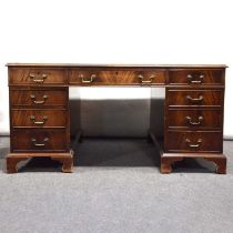 Reproduction mahogany twin pedestal partner's desk.