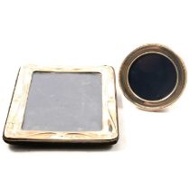 Two silver faced photograph frames,