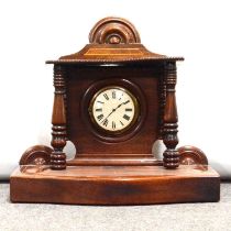 Mahogany and mixed wood portico clock,