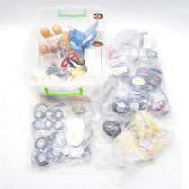 A box containing model aircraft wheels figures and spares