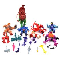 Seven He-Man action figures