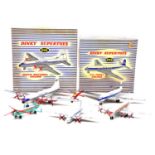 Five Dinky Toys die-cast aircraft, some boxed