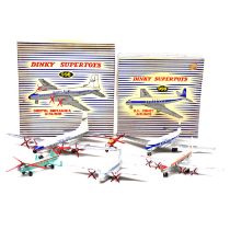 Five Dinky Toys die-cast aircraft, some boxed