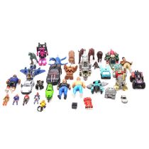 A collection of action figures, including Transformers