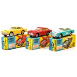 Three Corgi Toys models, 218 (x2), 309, boxed