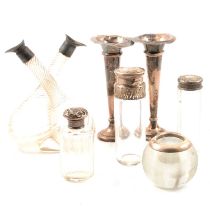 Collection of silver-mounted bottles and strikers