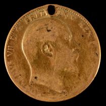 A gold Full Sovereign coin, Edward VII 1910, worn and pierced.