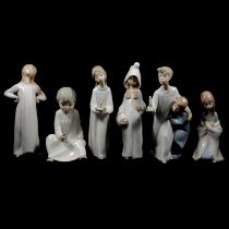 Five Lladro figures of children in nightgowns, and another similar figure