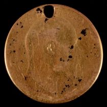 A gold Half Sovereign coin, Edward VII 1909, worn and pierced.