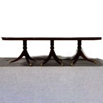 Reproduction mahogany triple pedestal table