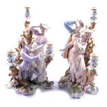 A pair of three light figural porcelain candelabra, Blind Man's Buff.
