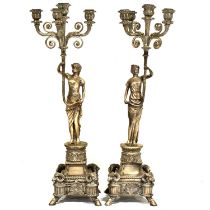 Pair of large silvered metal figural candelabra