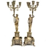 Pair of large silvered metal figural candelabra