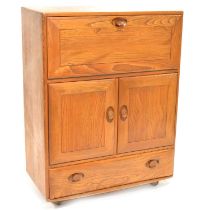 Ercol, a beech and elm serving cabinet, model 469