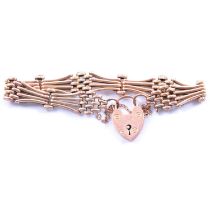 A rose metal gate link bracelet.