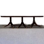 Reproduction mahogany triple pedestal table