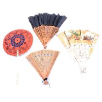 Collection of antique fans, some with bone sticks, others with wood sticks.