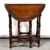 Carved oak Sutherland table,