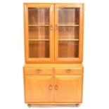 Ercol, beech and elm glazed cabinet
