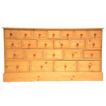 Large bank of pine drawers,