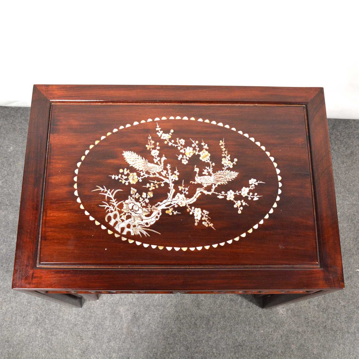 Nest of three Chinese hardwood tables, mother of pearl inlaid, and a barrel seat, - Image 2 of 4