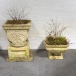 Two reconstituted stone garden planters,