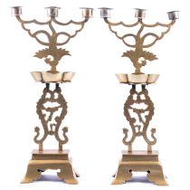 Pair of cast brass Chinese three-light candelabra